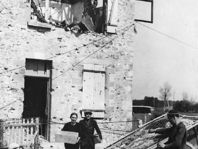 French Family Leaving Ruins of Their Home in Carentan Normandy 1944