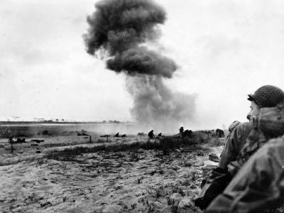 German 88 mm guns pound GIs on beach