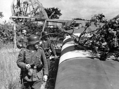 German troops examine an destroyed Waco CG-4 glider Normandy June 1944