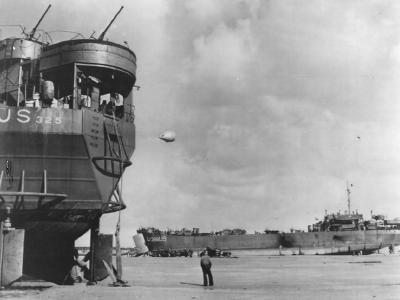 Landing Ship, Tank USS LST-326 and LST-388 Unloading on Normandy Beach during Low Tide June 1944