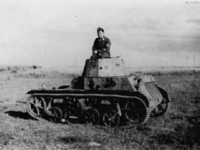 German soldier poses atop an AMR 33