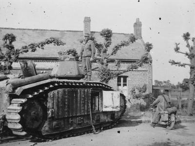 German soldier posing atop a Char B1 bis tank