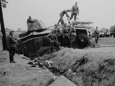German soldiers examining knocked out Char B1 bis tank 1940