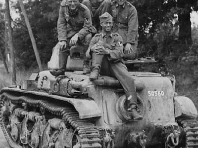 Wehrmacht soldiers atop Renault R35 registration number 50560