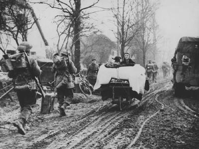 German Civilans Passing Canadian Infantry Kalkar 1945