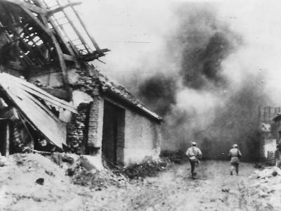 US 1st Army Soldiers Advance thru Burning Merzenich 1945