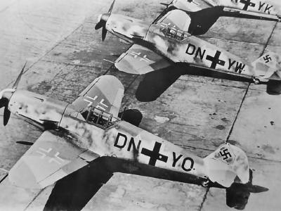Bf 109G lined up at an airfield