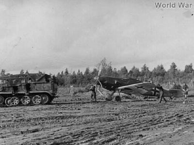 SdKfz 6 towing a Bf109
