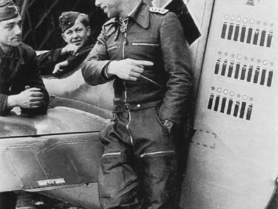 Oberleutnant Adolf Glunz posing