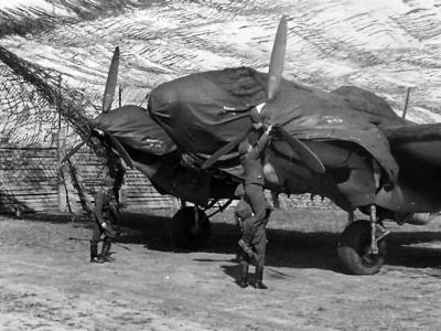 Heinkel He111 bomber – engines and canopy are covered with a tarpaulin to protect it against the weather.