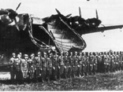 German soldiers stand before boarding a Me 323