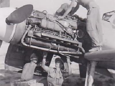 Me 109 F-4/trop of the 5/JG 27 during maintenance – 1942