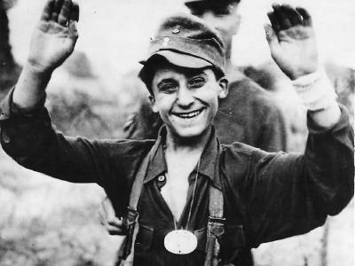 Smiling German Boy Soldier after His Capture in Caen 1944