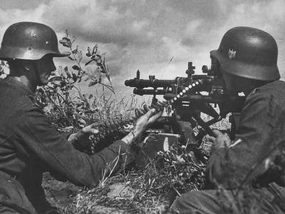 Wehrmacht soldiers on MG 34 machine gun post