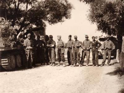 Wehrmacht soldiers lined up on the road