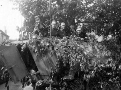 Rear view of a heavily camouflaged Sd.Kfz. 251/3 ausf D 3