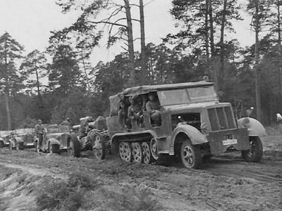 German medium halftrack Sdkfz 7 towing gun