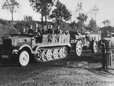 German medium halftrack SdKfz 6/1 towing gun