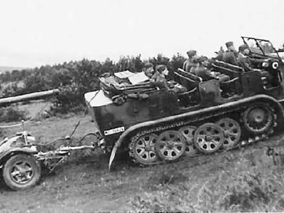 German medium halftrack Sdkfz 7 towing Flak 88