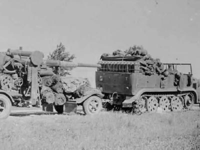 SdKfz 7 halftrack towing Flak 88