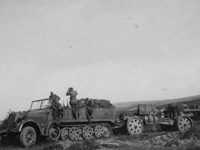 SdKfz 7 towing a sFH 18 heavy field howitzer