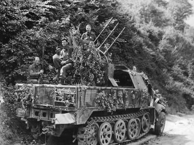 US troops atop SdKfz 7/1 of the 2.SS-Panzer-Division Das Reich in Normandy
