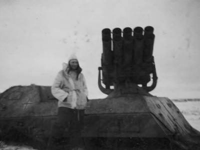 German soldier posing beside with Sd.Kfz. 4/1