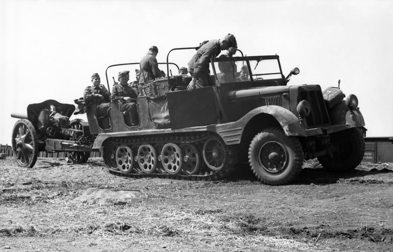 German light halftrack SdKfz 11 towing gun eastern front | World War Photos