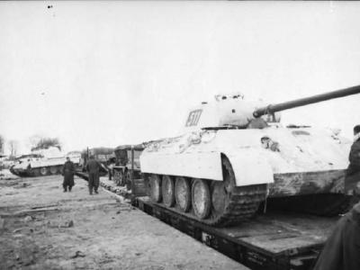 Panther Ausf A tank number 511 on a rail flat car winter camouflage 1944