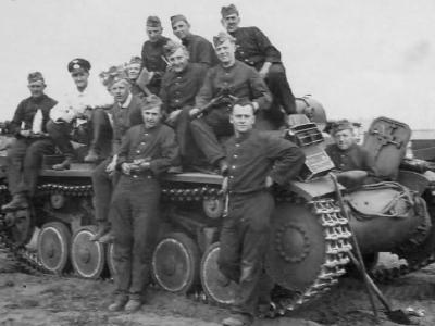 German soldiers posing with Panzer 2 tank