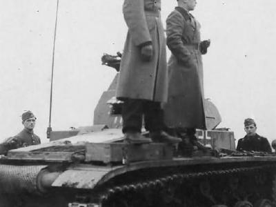 Two German officers atop a Panzer II tank
