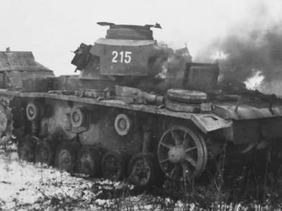 Burning Panzer III tactical number 215