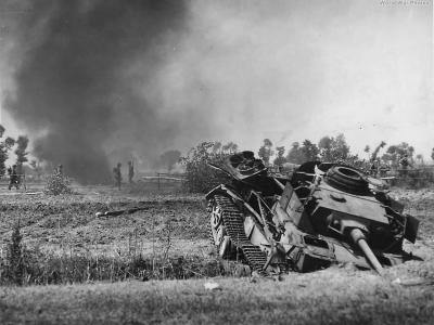 US Troops advance past knocked out Panzer IV in Italy 1943