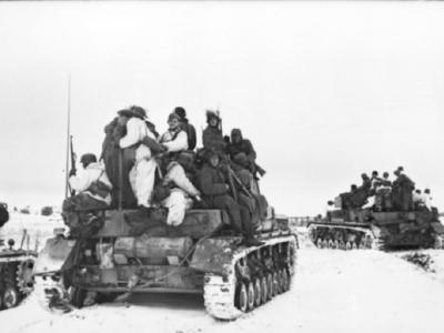 Panzer IV tanks and German Infantry winter eastern front
