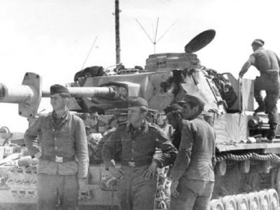 Damaged Panzer IV and crew eastern front