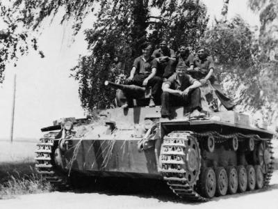 Crew atop a Panzer III 5