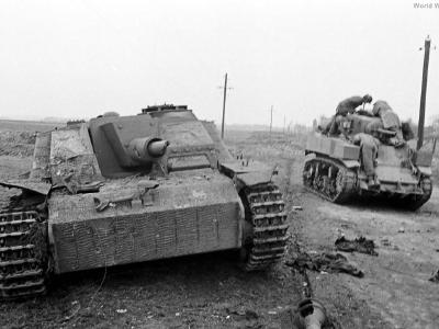 Destroyed StuG 40 and M5A1