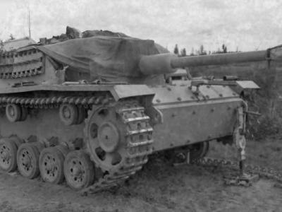 Damaged StuG 40 with additional armor plating bolted on to the bow