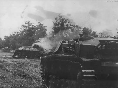 StuG III A of Leibstandarte SS Adolf Hitler approaches destroyed T-34
