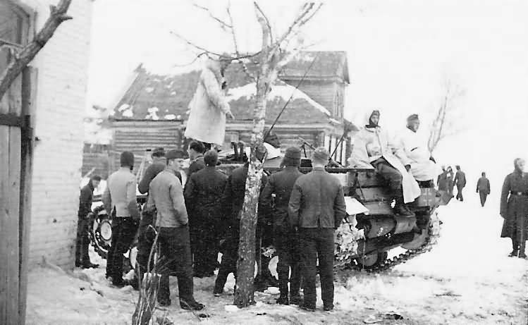 Wehrmacht troops in russian winter and StuG III assault gun
