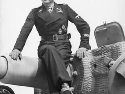 Michael Wittmann sitting on a Panzer VI Tiger