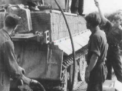 Late Tiger I (zimmerit + steel wheels) of the schwere Panzer Abteilung 509 rear view