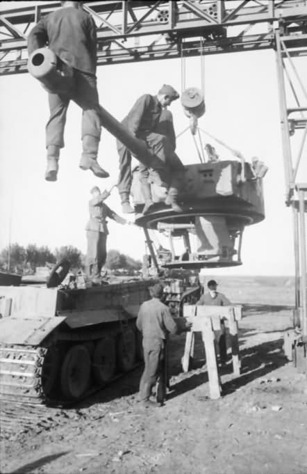 Crew of of the 3/schwere Panzerabteilung 503 removes the turret from Tiger tank #322