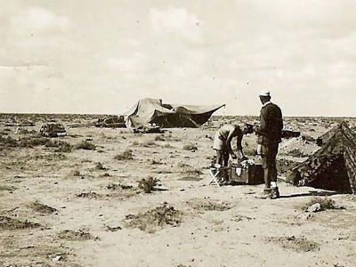 German afrika korps troops by tent in desert