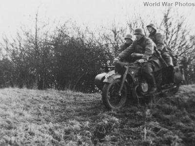 Waffen-SS soldiers riding a BMW R12 with side car