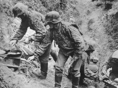 Soldiers preparing a meal at an outpost on the Western Front ’40