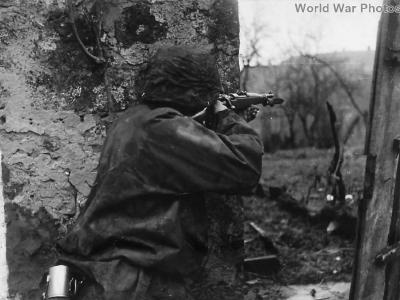 Waffen SS soldier firing 98k Mauser on Eastern Front