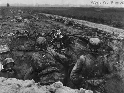 Waffen SS troops with MG34 mounted on Lafette heavy tripod 1940