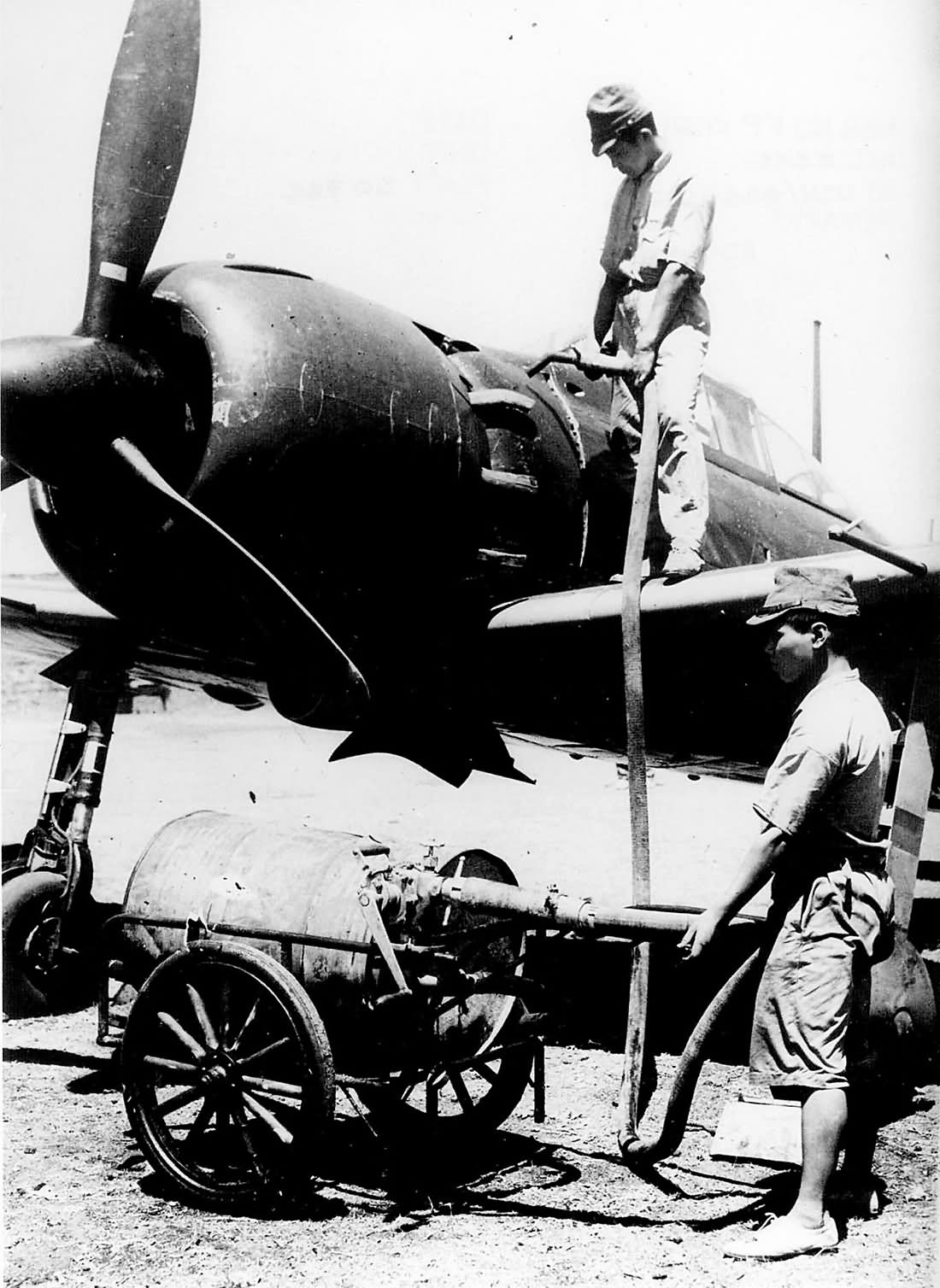 Mitsubishi A6M5 Zero being fueled for mission Saipan 1944