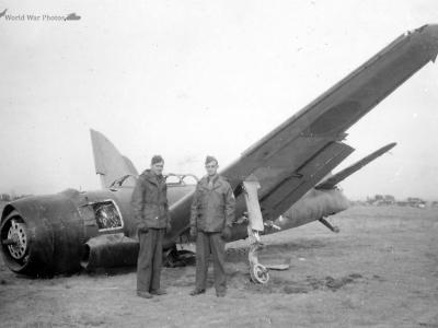 6th Army GIs next to wrecked C6N